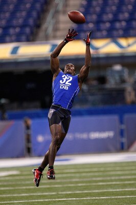 INDIANAPOLIS, IN - MARCH 2: Defensive back Devin McCourty of Rutgers jumps in the air to catch the football in drills during the NFL Scouting Combine presented by Under Armour at Lucas Oil Stadium on March 2, 2010 in Indianapolis, Indiana. (Photo by Scott