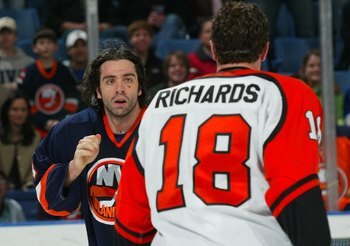 UNIONDALE, NY - APRIL 2:  Joel Bouchard #4 of the New York Islanders prepares to fight Mike Richards #18 of the Philadelphia Flyerson April 2, 2006 at the Nassau Coliseum in Uniondale, New York.  (Photo by Bruce Bennett/Getty Images)