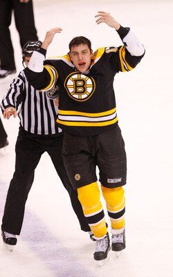 BOSTON, MA - FEBRUARY 28:  Milian Lucic #17 of the Boston Bruins reacts after a fight with Jarkko Ruutu #37 of the Pittsburgh Penguins in the third period at the TD Banknorth Garden on February 28, 2008 in Boston, Massachusetts.   (Photo by Jim Rogash/Get