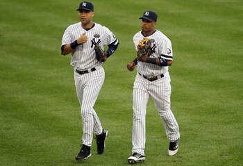NEW YORK - AUGUST 22:  Derek Jeter #2 and Robinson Cano #24 of the New York Yankees run off the field after an inning against the Seattle Mariners on August 22, 2010 at Yankee Stadium in the Bronx borough of New York City.  (Photo by Jim McIsaac/Getty Ima