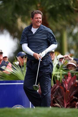 PALM BEACH GARDENS, FL - MARCH 03:  Hall-of-Fame NFL quarterback Dan Marino of the Miami Dolphins follows his tee shot on the first hole during the Honda Classic Kenny G Gold Pro-Am at PGA National Resort And Spa on March 3, 2010 in Palm Beach Gardens, Fl