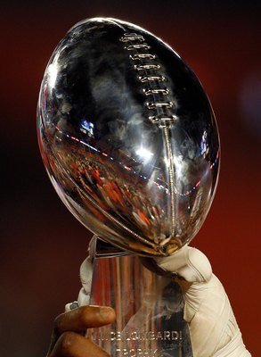MIAMI GARDENS, FL - FEBRUARY 07:  A detail of the Vince Lombardi Trophy as the New Orleans Saints celebrate after defeating the Indianapolis Colts during Super Bowl XLIV on February 7, 2010 at Sun Life Stadium in Miami Gardens, Florida.  (Photo by Jonatha