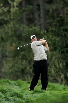 PEBBLE BEACH, CA - FEBRUARY 12:  Dallas Cowboys quarterback Tony Romo hits his tee shot on the 12th hole during the second round of the AT&T Pebble Beach National Pro-Am at Spyglass Hill Golf Course on February 12 2010 in Pebble Beach, California.  (Photo