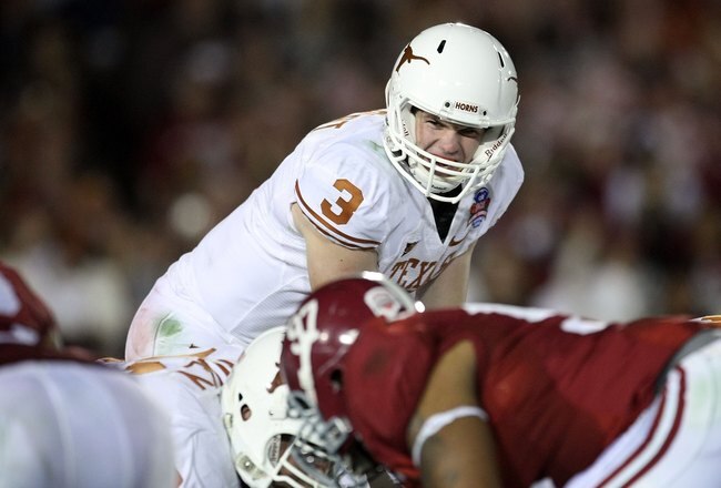 PASADENA, CA - JANUARY 07:  Quarterback Garrett Gilbert #3 of the Texas Longhorns under center against the Alabama Crimson Tide during the Citi BCS National Championship game at the Rose Bowl on January 7, 2010 in Pasadena, California.  (Photo by Stephen 