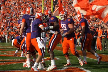 CLEMSON, SC - NOVEMBER 21:  Teammates Kyle Parker #11 and Dwayne Allen #83 of the Clemson Tigers celebrate after a touchdown against the Virginia Cavaliers during their game at Memorial Stadium on November 21, 2009 in Clemson, South Carolina.  (Photo by S