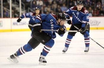 DENVER - MARCH 24:  Ryan O'Reilly #37 of the Colorado Avalanche takes a shot against the Los Angeles Kings during NHL action at the Pepsi Center on March 24, 2010 in Denver, Colorado. The Avalanche defeated the Kings 4-3 in an overtime shootout.  (Photo b