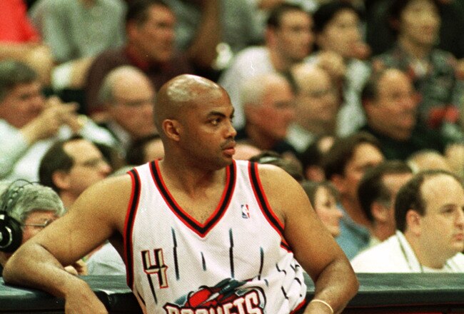 19 Apr 2000:  Forward Charles Barkley #4 of the Houston Rockets watches the action from the scorers table during his final NBA game at the Houston Summit in Houston, Texas. The Grizzlies won the game 96-92. Mandatory Credit: George Wong/ALLSPORT