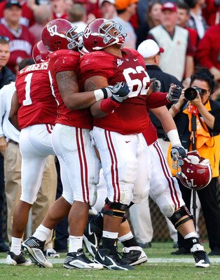 TUSCALOOSA, AL - OCTOBER 24:  Lorenzo Washington #97 celebrates with Terrence Cody #62 of the Alabama Crimson Tide after Cody blocked a field goal in the first half against the Tennessee Volunteers at Bryant-Denny Stadium on October 24, 2009 in Tuscaloosa