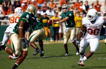 WACO, TX - NOVEMBER 14:  Quarterback Nick Florence #11 of the Baylor Bears drops back to pass during the first half against the Texas Longhorns on November 14, 2009 at Floyd Casey Stadium in Waco, Texas.  The Longhorns beat the Bears 47-14.  (Photo by Tom