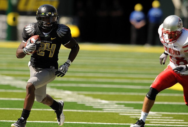 EUGENE, OR - SEPTEMBER 04: Running back Kenjon Barner #24 of the Oregon Ducks heads for the endzone past safety Bubba Forrest of the New Mexico Lobos and a touchdown in the second quarter of the game at Autzen Stadium on September 4, 2010 in Eugene, Orego