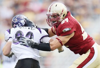 CHESTNUT HILL, MA - SEPTEMBER 04:  Mark Herzlich #94 of the Boston College Eagles blocks Erik Walker #83 of the Weber State Wildcats on September 4, 2010 at Alumni Stadium in Chestnut Hill, Massachusetts. Boston College defeated Weber State 38-20.  (Photo