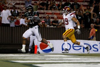 HONOLULU - SEPTEMBER 2:  Kealoha Pilares of the University of Hawaii Warriors  scores a touchdown during secondhalf action at Aloha Stadium September 2, 2010 in Honolulu, Hawaii. (Photo by Kent Nishimura/Getty Images)