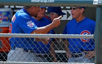 CHICAGO - JUNE 25: Starting pitcher Carlos Zambrano #38 of the Chicago Cubs (L) yells at manager Lou Pinella #41 (center) and bench coach Alan Trammell #3 after giving up four runs in the 1st inning to the Chicago White Sox at U.S. Cellular Field on June 
