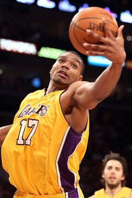 LOS ANGELES, CA - JUNE 17:  Andrew Bynum #17 of the Los Angeles Lakers rebounds the ball in Game Seven of the 2010 NBA Finals against the Boston Celtics at Staples Center on June 17, 2010 in Los Angeles, California.  NOTE TO USER: User expressly acknowled