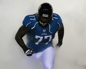JACKSONVILLE, FL - DECEMBER 17:  Uche Nwaneri #77 of the Jacksonville Jaguars takes the field during player introductions against the Indianapolis Colts at Jacksonville Municipal Stadium on December 17, 2009 in Jacksonville, Florida.  (Photo by Sam Greenw