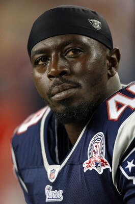 FOXBORO, MA - SEPTEMBER 03:  Derrick Burgess #49 of the New England Patriots looks on from the bench in the first half against the New York Giants on September 3, 2009 at Gillette Stadium in Foxboro, Massachusetts.  (Photo by Elsa/Getty Images)
