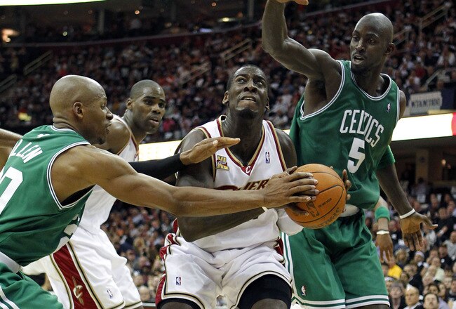 CLEVELAND - MAY 03:  J.J. Hickson #21 of the Cleveland Cavaliers tries to get around the defense of Ray Allen #20 and Kevin Garnett #5 of the Boston Celtics in Game Two of the Eastern Conference Semifinals during the 2010 NBA Playoffs at Quicken Loans Are