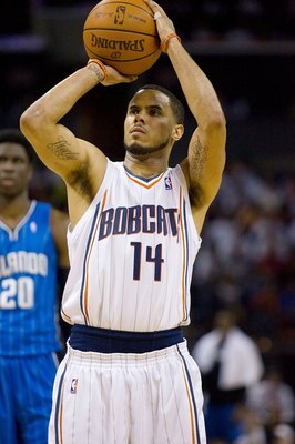 CHARLOTTE, NC - APRIL 26: D.J. Augustin #14 of the Charlotte Bobcats attempts a free throw against the Orlando Magic at Time Warner Cable Arena on April 26, 2010 in Charlotte, North Carolina.  The Magic defeated the Bobcats 99-90 to complete the four game