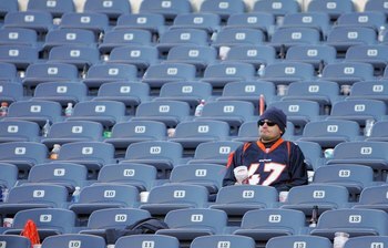 DENVER - JANUARY 22:  A lone dejected Fan of the Denver Broncos remains in the stands following the Broncos 34-17 loss against the Pittsburgh Steelers during the AFC Championship Game January 22, 2006 at Invesco Field at Mile High in Denver, Colorado.  (P