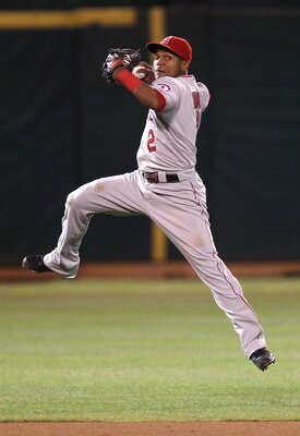 OAKLAND, CA - SEPTEMBER 3:  Erick Aybar #2 of the Los Angeles Angels of Anaheim fails to throw out Kurt Suzuki of the Oakland Athletics in the seventh inning during a Major League Baseball game at the Oakland-Alameda County Coliseum on September 3, 2010 i