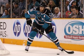 SAN JOSE, CA - MAY 18:  Joe Thornton #19 of the San Jose Sharks moves the puck while taking on the Chicago Blackhawks in Game Two of the Western Conference Finals during the 2010 NHL Stanley Cup Playoffs at HP Pavilion on May 18, 2010 in San Jose, Califor