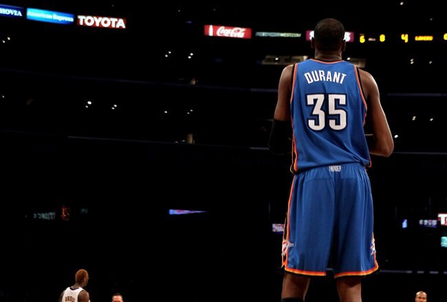 LOS ANGELES, CA - APRIL 18:  Kevin Durant #35 of the Oklahoma City Thunder stands on the court beneath  Los Angeles Lakers banners during  Game One of the Western Conference Quarterfinals of the 2010 NBA Playoffs on April 18, 2010 at Staples Center in Los
