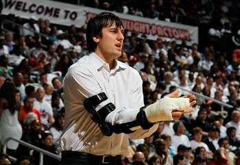 ATLANTA - APRIL 20:  Andrew Bogut #6 of the Milwaukee Bucks cheers on his team against the Atlanta Hawks at Philips Arena on April 20, 2010 in Atlanta, Georgia.  NOTE TO USER: User expressly acknowledges and agrees that, by downloading and/or using this P