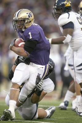 SEATTLE - DECEMBER 05:  Chris Polk #1 of the Washington Huskies carries the ball during game against the California Bears on December 5, 2009 at Husky Stadium in Seattle, Washington. The Huskies defeated the Bears 42-10. (Photo by Otto Greule Jr/Getty Ima