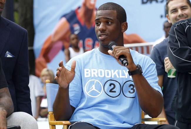 NEW YORK CITY, NY - AUGUST 13: Carmelo Anthony (L) and Chris Paul of USAB speak during the World Basketball Festival at Rucker Park on August 13, 2010 in New York City.  (Photo by Chris Trotman/Getty Images for Nike)
