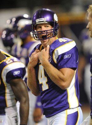 MINNEAPOLIS - SEPTEMBER 02:  Brett Favre #4 of the Minnesota Vikings yawns during warmups prior to an NFL preseason game against the Denver Broncos at the Mall of America Field at Hubert H. Humphrey Metrodome, on September 2, 2010 in Minneapolis, Minnesot