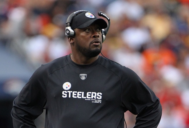 DENVER - AUGUST 29:  Head coach Mike Tomlin of the Pittsburgh Steelers leads his team against the Denver Broncos during preseason NFL action at INVESCO Field at Mile High on August 29, 2010 in Denver, Colorado. The Broncos defeated the Steelers 34-17.  (P