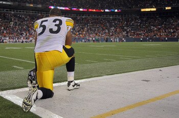 DENVER - AUGUST 29:  Center Maurkice Pouncey #53 of the Pittsburgh Steelers watches from the sidelines against the Denver Broncos during preseason NFL action at INVESCO Field at Mile High on August 29, 2010 in Denver, Colorado. The Broncos defeated the St