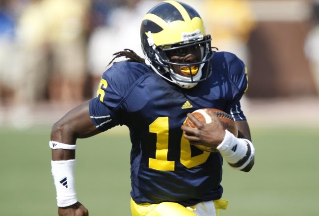 ANN ARBOR, MI - SEPTEMBER 5:  Denard Robinson #16 of the Michigan Wolverines carries the ball during the game against the Western Michigan Broncos on September 5, 2009 at Michigan Stadium in Ann Arbor, Michigan. (Photo by Gregory Shamus/Getty Images)
