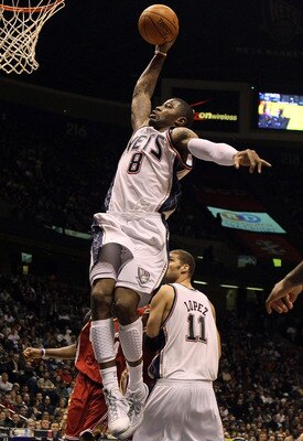 EAST RUTHERFORD, NJ - MARCH 03:  Terrence Williams #8 of the New Jersey Nets dunks against the Cleveland Cavaliers at the Izod Center on March 3, 2010 in East Rutherford, New Jersey.NOTE TO USER: User expressly acknowledges and agrees that, by downloading