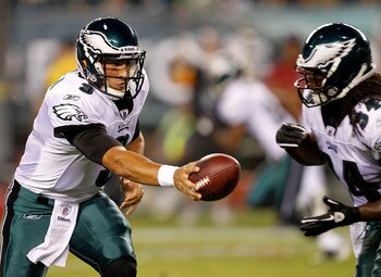 PHILADELPHIA - SEPTEMBER 02: Mike Kafka #3 hands off to Eldra Buckley #34 of the Philadelphia Eagles of the New York Jets at Lincoln Financial Field on September 2, 2010 in Philadelphia, Pennsylvania. (Photo by Jeff Zelevansky/Getty Images)