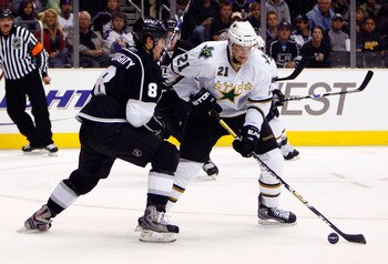 LOS ANGELES, CA - MARCH 31:  Loui Eriksson #21 of the Dallas Stars is pressured by Drew Doughty #8 of the Los Angeles Kings during the first period at Staples Center on March 31, 2009 in Los Angeles, California.  The Stars defeated the Kings 3-2.  (Photo
