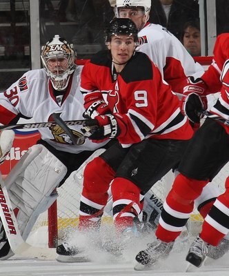 NEWARK, NJ - DECEMBER 18:  Zach Parise #9 of the New Jersey Devils skates against the Ottawa Senators at the Prudential Center on December 18, 2009 in Newark, New Jersey.  (Photo by Bruce Bennett/Getty Images)
