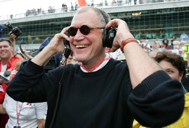 INDIANAPOLIS - MAY 30:  David Letterman, co-owner of the #15 Rahal-Letterman Argent/Pioneer G Force Honda of Buddy Rice, smiles when the rain started to fall and cause the race to be shortened and Rice to win the 88th running of the Indianapolis 500 part