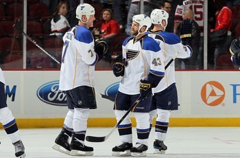 NEWARK, NJ - MARCH 20:  Mike Weaver #43 and Keith Tkachuk #7 of the St. Louis Blues celebrate after defeating the New Jersey Devils at the Prudential Center on March 20, 2010 in Newark, New Jersey. The Blues defeated the Devils 1-0.  (Photo by Jim McIsaac