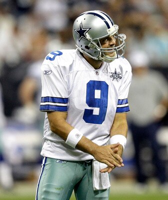 HOUSTON - AUGUST 28: Quarterback Tony Romo #9 of the Dallas Cowboys encourages his offensive line after a penalty was called on the play during a football game against the Houston Texans at Reliant Stadium on August 28, 2010 in Houston, Texas. Houston won