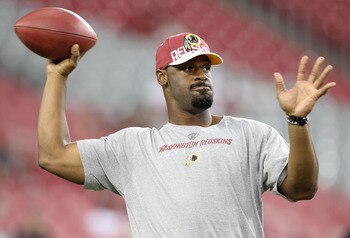 GLENDALE, AZ - SEPTEMBER 02:  Quarterback Donovan McNabb #5 of the Washington Redskins warms up before the preseason NFL game against the Arizona Cardinals at the University of Phoenix Stadium on September 2, 2010 in Glendale, Arizona.  (Photo by Christia
