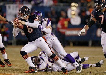 CHICAGO - DECEMBER 28: Jay Cutler #6 of the Chicago Bears is sacked by Brian Robison #96 of the Minnesota Vikings at Soldier Field on December 28, 2009 in Chicago, Illinois. The Bears defeated the Vikings 36-30 in overtime. (Photo by Jonathan Daniel/Getty