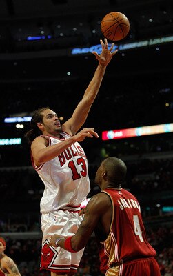CHICAGO - APRIL 25: Joakim Noah #13 of the Chicago Bulls puts up a shot over Antawn Jamison #4 of the Cleveland Cavaliers in Game Four of the Eastern Conference Quarterfinals during the 2010 NBA Playoffs at the United Center on April 25, 2010 in Chicago, 