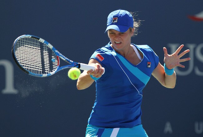 NEW YORK - SEPTEMBER 05:  Kim Clijsters of Belgium returns a shot against Ana Ivanovic of Serbia during her women's singles match on day seven of the 2010 U.S. Open at the USTA Billie Jean King National Tennis Center on September 5, 2010 in the Flushing n