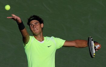NEW YORK - SEPTEMBER 05:  Rafael Nadal of Spain serves against Gilles Simon of France during the men's singles match on day seven of the 2010 U.S. Open at the USTA Billie Jean King National Tennis Center on September 5, 2010 in the Flushing neighborhood o
