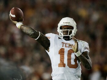 PASADENA, CA - JANUARY 04:  Quarterback Vince Young #10 of the Texas Longhorns throws the football against the USC Trojans in the third quarter during the BCS National Championship Rose Bowl Game on January 4, 2006 in Pasadena, California.  (Photo by Dona