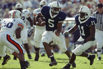 ORLANDO, FL - JANUARY 1:  Tailback Larry Johnson #5 of the Pennsylvania State University Lions carries the ball against the Auburn University Tigers during the Capital One Bowl at Florida Citrus Bowl Stadium on January 1, 2003 in Orlando, Florida.  Auburn