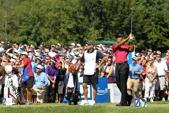 NORTON, MA - SEPTEMBER 06:  Tiger Woods tees off on the third hole during the final round of the Deutsche Bank Championship at TPC Boston on September 6, 2010 in Norton, Massachusetts.  (Photo by Mike Ehrmann/Getty Images)