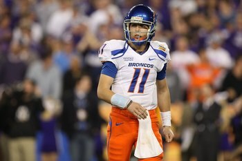 GLENDALE, AZ - JANUARY 04:  Quarterback Kellen Moore #11 of the Boise State Broncos looks over to his sideline in the second half against the TCU Horned Frogs during the Tostitos Fiesta Bowl at the Universtity of Phoenix Stadium on January 4, 2010 in Glen