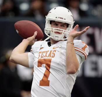HOUSTON - SEPTEMBER 04:  Quarterback Garrett Gilbert #7 of the Texas Lonhgorns throws passes during pre-game warmups before playing the Rice Owls at Reliant Stadium on September 4, 2010 in Houston, Texas. Texas beat Rice 34-17.  (Photo by Bob Levey/Getty 